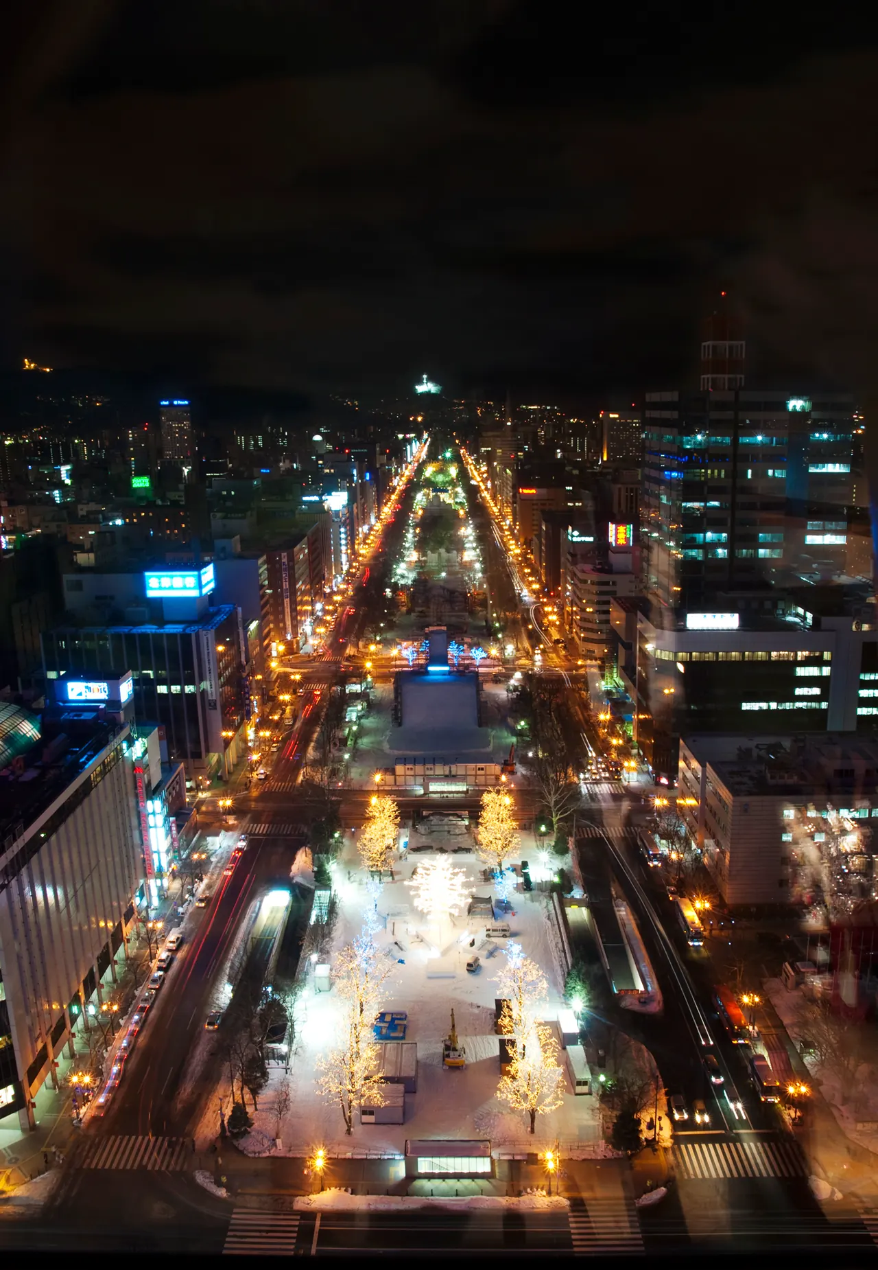 Sapporo Odori Park at dusk, representative of central Sapporo hotel bases